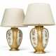 A PAIR OF PARCEL-GILT PORCELAIN VASES, MOUNTED AS LAMPS - photo 1