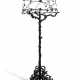 A WROUGHT-IRON STANDING LAMP - Foto 1