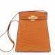 Hermes. A COGNAC OSTRICH KELLY SPORT 24 BAG WITH GOLD HARDWARE - photo 1