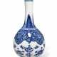 A BLUE AND WHITE 'LOTUS' BOTTLE VASE - фото 1