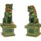 A PAIR OF MASSIVE TILEWORKS FIGURES OF SEATED BUDDHIST LIONS... - фото 1