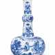 A BLUE AND WHITE BOTTLE VASE - фото 1