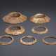 A GROUP OF SEVEN BROWNISH-IVORY-COLORED OPAQUE STONE FLANGED... - фото 1