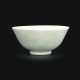 A RARE AND FINELY INCISED PALE CELADON-GLAZED 'BATS' BOWL - photo 1