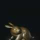 A BRONZE AND SILVER INLAID MODEL OF A RABBIT - фото 1