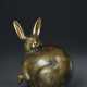 A LACQUERED WOOD MODEL OF A RABBIT - Foto 1