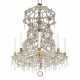 A LOUIS XIV STYLE GILT-METAL AND BEADED CUT-GLASS AND ROCK CRYSTAL EIGHT-LIGHT CHANDELIER - Foto 1