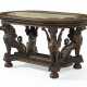 AN AMERICAN NEO-GREC PARCEL-GILT, PATINATED BRONZE, MEXICAN ONYX AND ROSEWOOD CENTER TABLE - Foto 1