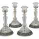 A SET OF FOUR AUSTRIAN SILVER-GILT AND ENAMEL-MOUNTED ROCK CRYSTAL CANDLESTICKS - Foto 1
