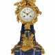 A FINE FRENCH ORMOLU-MOUNTED LAPIS LAZULI AND BLOODSTONE MANTLE CLOCK - фото 1