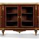 A FRENCH ORMOLU-MOUNTED KINGWOOD, ROSEWOOD AND BOIS SATINE PARQUETRY COMMODE - photo 1
