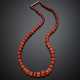 Graduated red/orange coral bead necklace with yellow gold clasp - photo 1