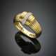 SABBADINI | Yellow gold reeded bangle with a diamond accented central that covers the clasp - photo 1