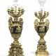 A PAIR OF FRENCH GILT AND PATINATED BRONZE EIGHT-LIGHT CANDELABRA - фото 1