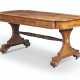 McLean, John. A REGENCY BRASS-MOUNTED BRAZILIAN ROSEWOOD AND SATINWOOD-CROSSBANDED WRITING-TABLE - photo 1