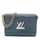 LOUIS VUITTON. A SHINY LIGHT BLUE POROSUS CROCODILE TWIST WITH SILVER HARDWARE - фото 1