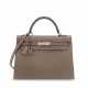 HERMÈS. A GRIS TOURTERELLE OSTRICH SELLIER KELLY 32 WITH PALLADIUM HARDWARE - photo 1