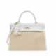 HERMÈS. A WHITE CLÉMENCE LEATHER & TOILE RETOURNÉ KELLY 35 WITH PALLADIUM HARDWARE - photo 1