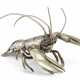 A SILVERED-METAL MODEL OF A LOBSTER - Foto 1