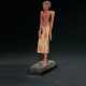 AN EGYPTIAN POLYCHROME WOOD FIGURE OF AN OFFICIAL - photo 1