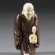 NETSUKE MIT DARSTELLUNG VON LACHENDEM BUDDHA MILE - Foto 1