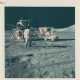 Eugene Cernan with the LM, the Rover and the US flag; Cernan saluting the US flag at Taurus-Littrow, December 7-19, 1972, EVA 1 - фото 1