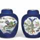 A PAIR OF POWDERED-BLUE GROUND FAMILLE VERTE GINGER JARS AND COVERS - photo 1