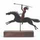 A RED AND BLACK PAINTED WOODEN INDIAN WARRIOR ON HORSEBACK W... - photo 1