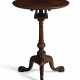 A CHIPPENDALE CARVED MAHOGANY TILT-TOP CANDLESTAND - photo 1