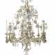 A SILVERED METAL AND CUT-GLASS EIGHT-LIGHT CHANDELIER - фото 1