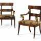 A PAIR OF NORTH EUROPEAN MAHOGANY AND PARCEL-GILT ARMCHAIRS ... - photo 1