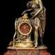 A FRENCH ORMOLU AND PATINATED-BRONZE MOUNTED FIGURAL MANTEL CLOCK - фото 1
