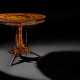 AN ITALIAN PENWORK, INTARSIA, EBONY AND STAINED FRUITWOOD MARQUETRY CENTRE-TABLE - Foto 1