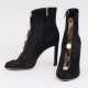 Jimmy Choo. Paar Highheels Ankle Boots in Schwarz mit offener Knopf-Leiste - Foto 1