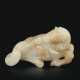 A WHITE AND PALE BROWN JADE FIGURE OF A ROLLING HORSE - photo 1