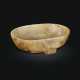 A BEIGE AND PALE RUSSET JADE OVAL CUP WITH HANDLE - photo 1