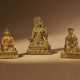 THREE MINIATURE GILT-BRONZE BUDDHIST FIGURES - photo 1