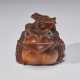 A CARVED WOOD SCULPTURE OF TOADS - photo 1