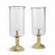 A PAIR OF REGENCE STYLE GILT-BRASS AND GLASS PHOTOPHORES - photo 1