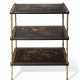 Jansen, Maison. A FRENCH GILT-METAL AND BLACK AND GILT LACQUERED ETAGERE - Foto 1