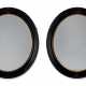 A PAIR OF VICTORIAN EBONISED AND PARCEL-GILT MIRRORS - photo 1