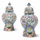 A PAIR OF DUTCH DELFT POLYCHROME BALUSTER VASES AND COVERS - фото 1