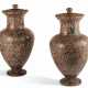 A PAIR OF NORTH EUROPEAN GRANITO ROSSO COVERED URNS - фото 1