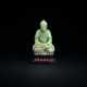 A PALE GREENISH-WHITE JADE SEATED FIGURE OF BUDDHA - photo 1