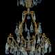 A FRENCH ORMOLU AND ROCK CRYSTAL TWELVE-LIGHT CHANDELIER - photo 1