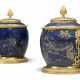 A PAIR OF FRENCH ORMOLU-MOUNTED PARCEL-GILT POWDER BLUE VASES AND COVERS - фото 1
