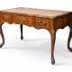 A GEORGE II CARVED MAHOGANY SERPENTINE WRITING-TABLE - photo 1