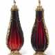 A PAIR OF GERMAN SILVER-GILT MOUNTED RUBY-GLASS BOTTLES - фото 1