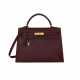 HERMÈS. A ROUGE H CALF BOX LEATHER SELLIER KELLY 32 WITH GOLD HARDWARE - photo 1