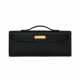 HERMÈS. A BLACK SWIFT LEATHER KELLY CUT WITH GOLD HARDWARE - photo 1